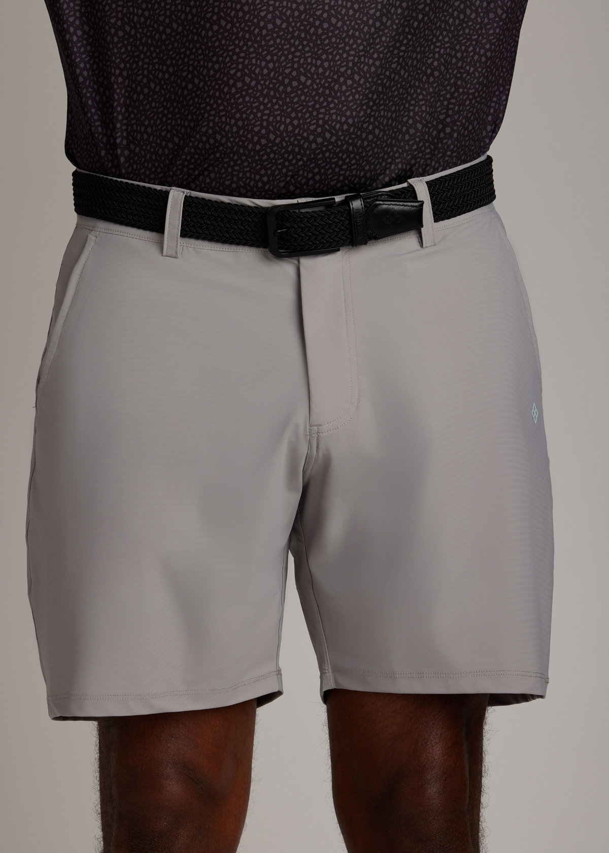 Black knitted pin buckle belt featuring a unique design for durability and flexible wear.