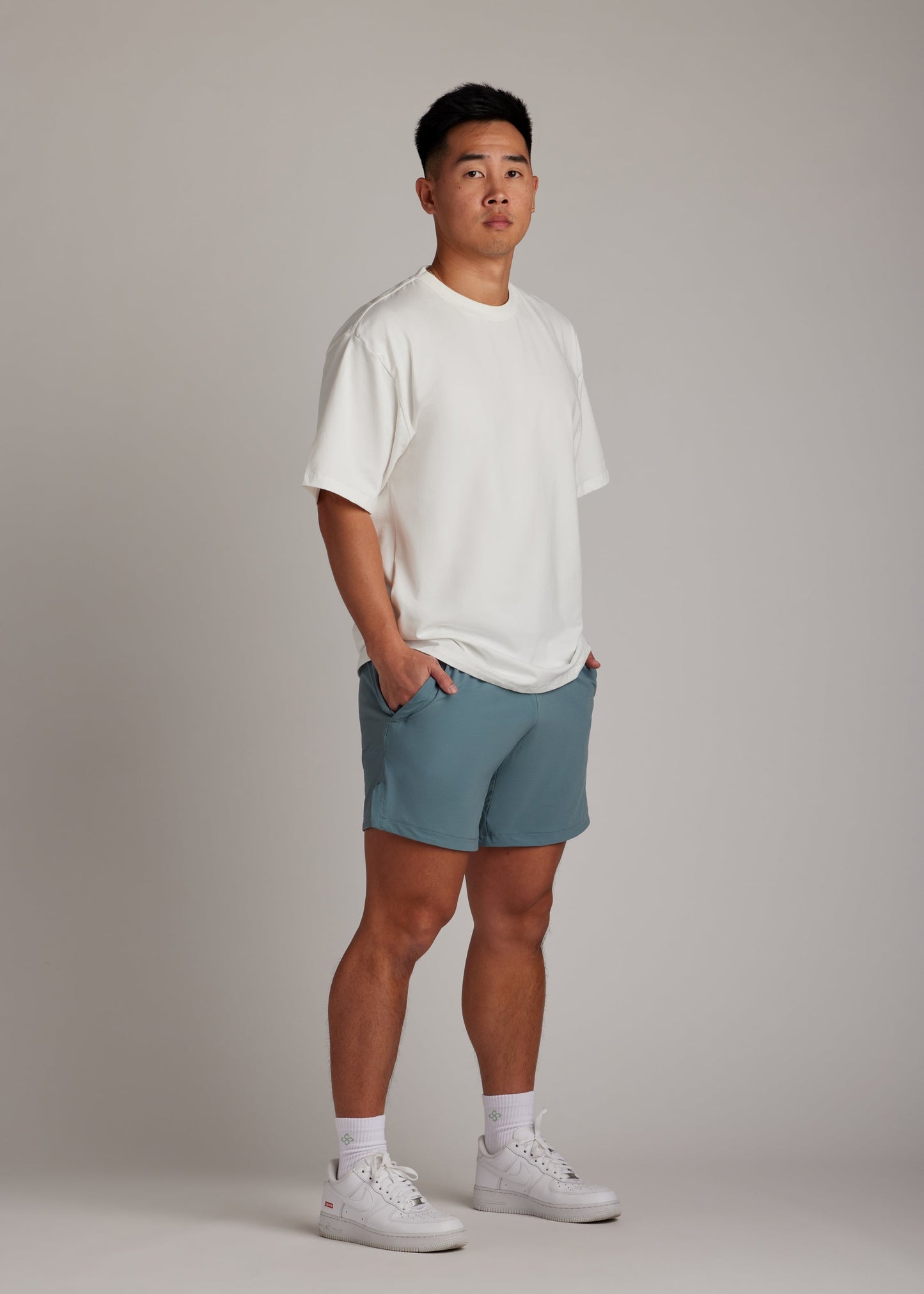 White oversized tee, soft breathable fabric, new wardrobe essential for laid-back comfort.