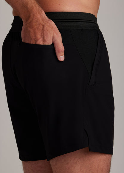 Black hyper-breathable active shorts with elastic drawstring waistband for running and training.