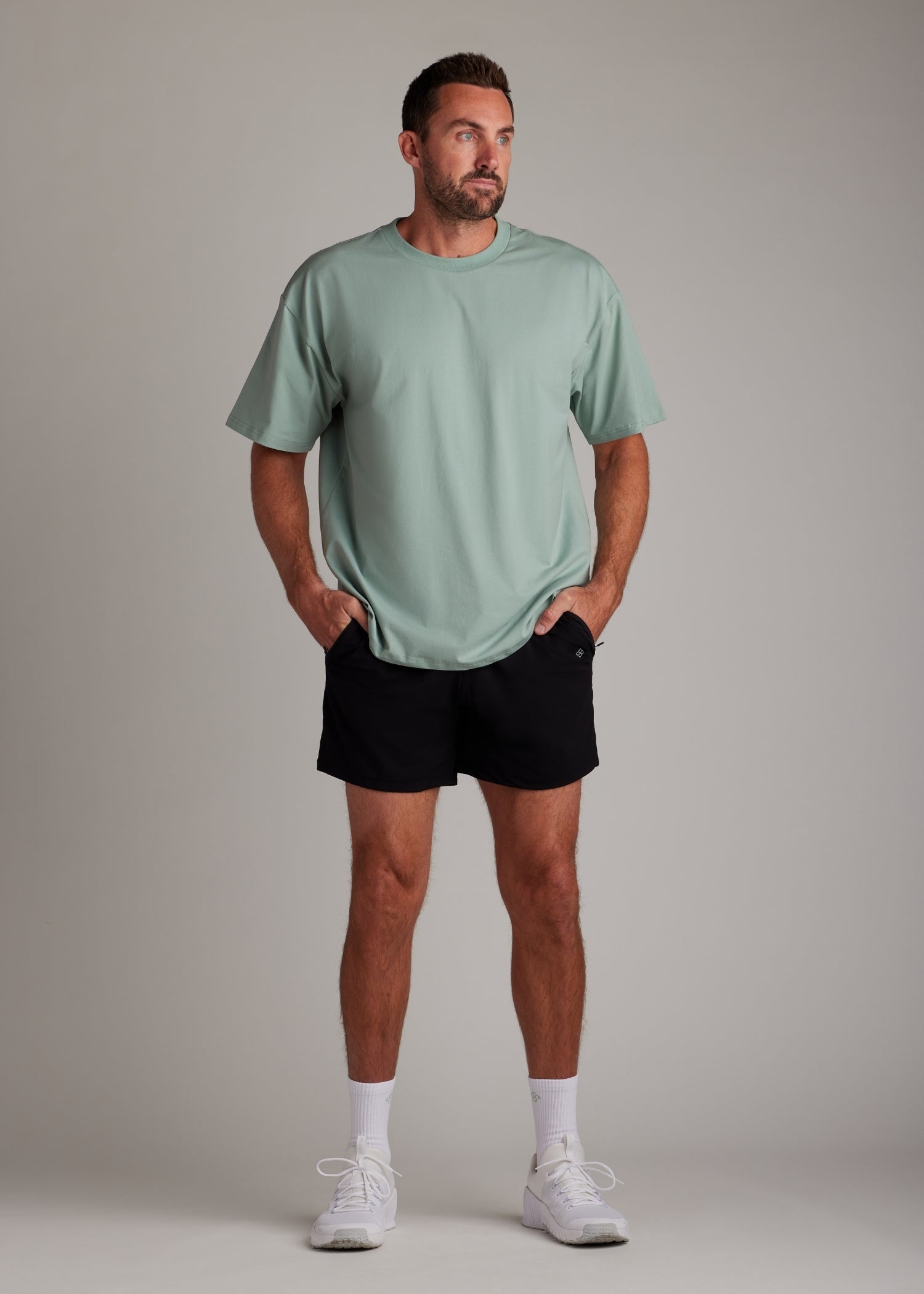 Black hyper-breathable active shorts with elasticated drawstring waistband, ideal for running and training.