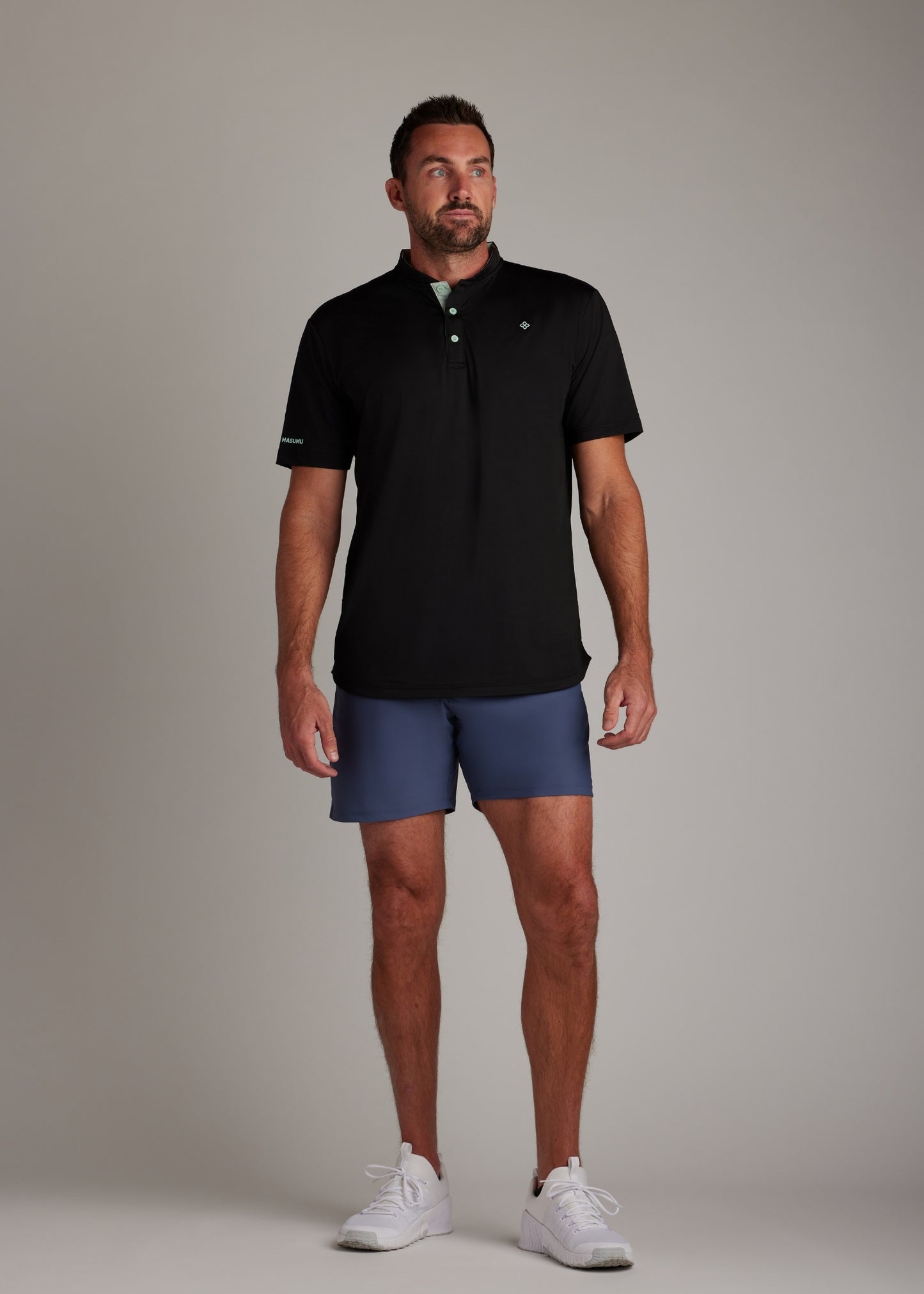 Black bladed collar polo shirt designed for ultimate style, performance, and comfort.