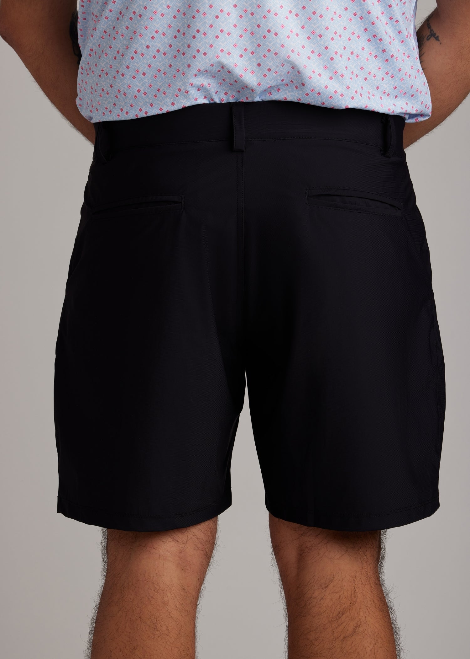 Black ultra-lightweight four-way stretch golf walk shorts, perfect for active wear.