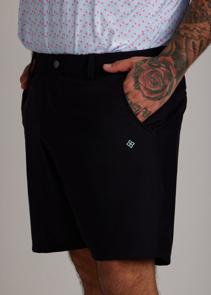 Black ultra-lightweight four-way stretch golf walk shorts, offering maximum comfort.