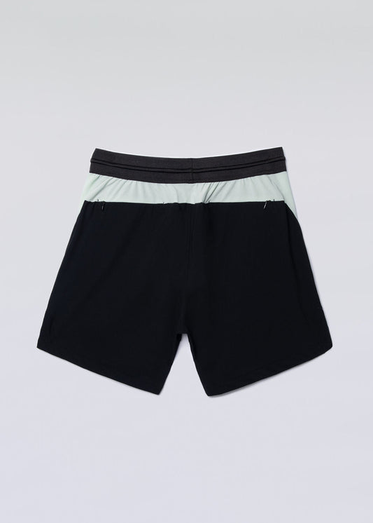 Black and green hyper-breathable active shorts for running and training.