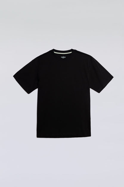 Black oversized tee made from soft, breathable fabric for everyday comfort.