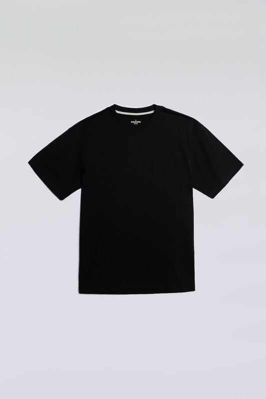 Black oversized tee made from soft, breathable fabric for everyday comfort.