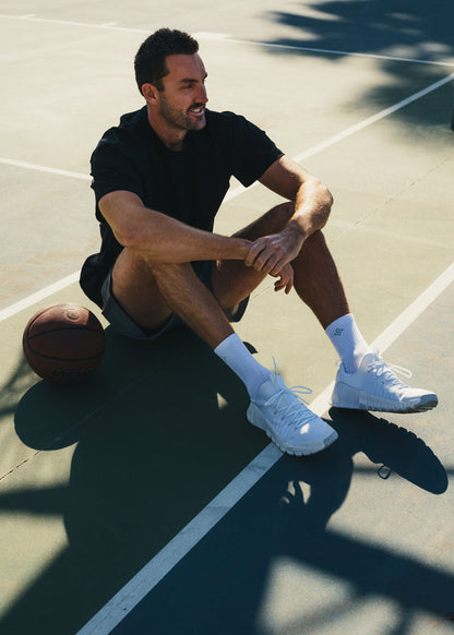 Black oversized tee made from soft, breathable fabric for everyday comfort.