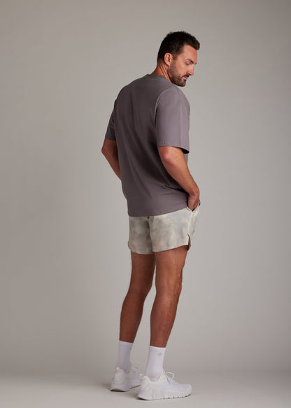 Comfortable charcoal oversized tee in a soft, breathable blend, ideal for laid-back days.