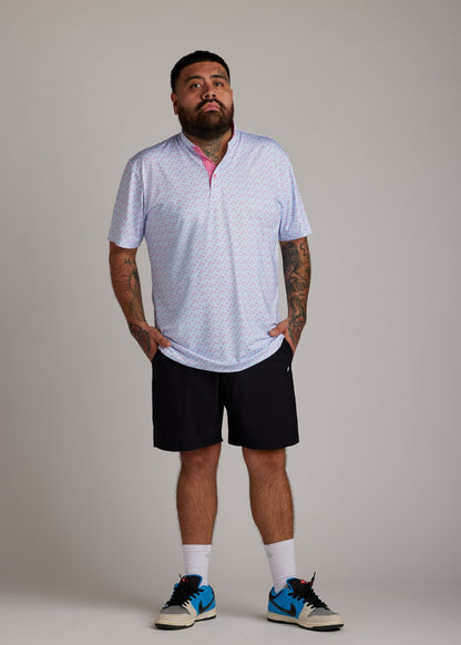 Cotton candy bladed polo shirt, designed with sleek performance fabric for golf.