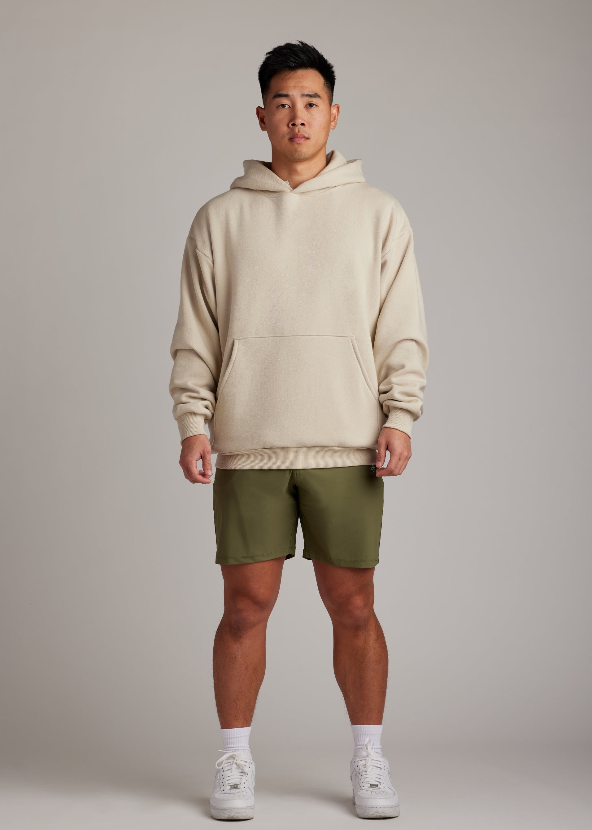 Cream oversized Tomorrow Hoodie made with a premium cotton blend, perfect for casual wear.