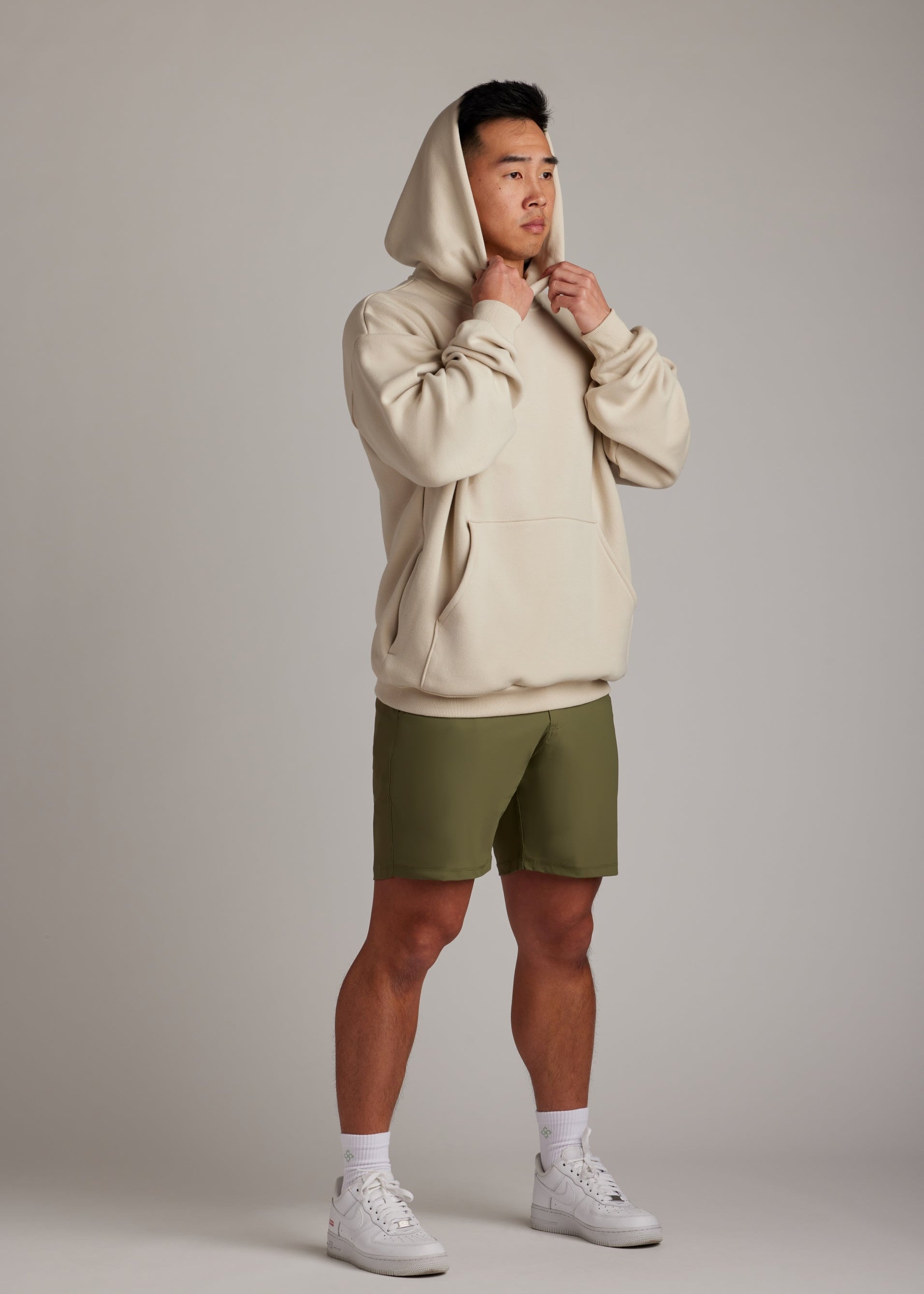Cream Tomorrow Hoodie, an oversized premium cotton blend outerwear for modern comfort.