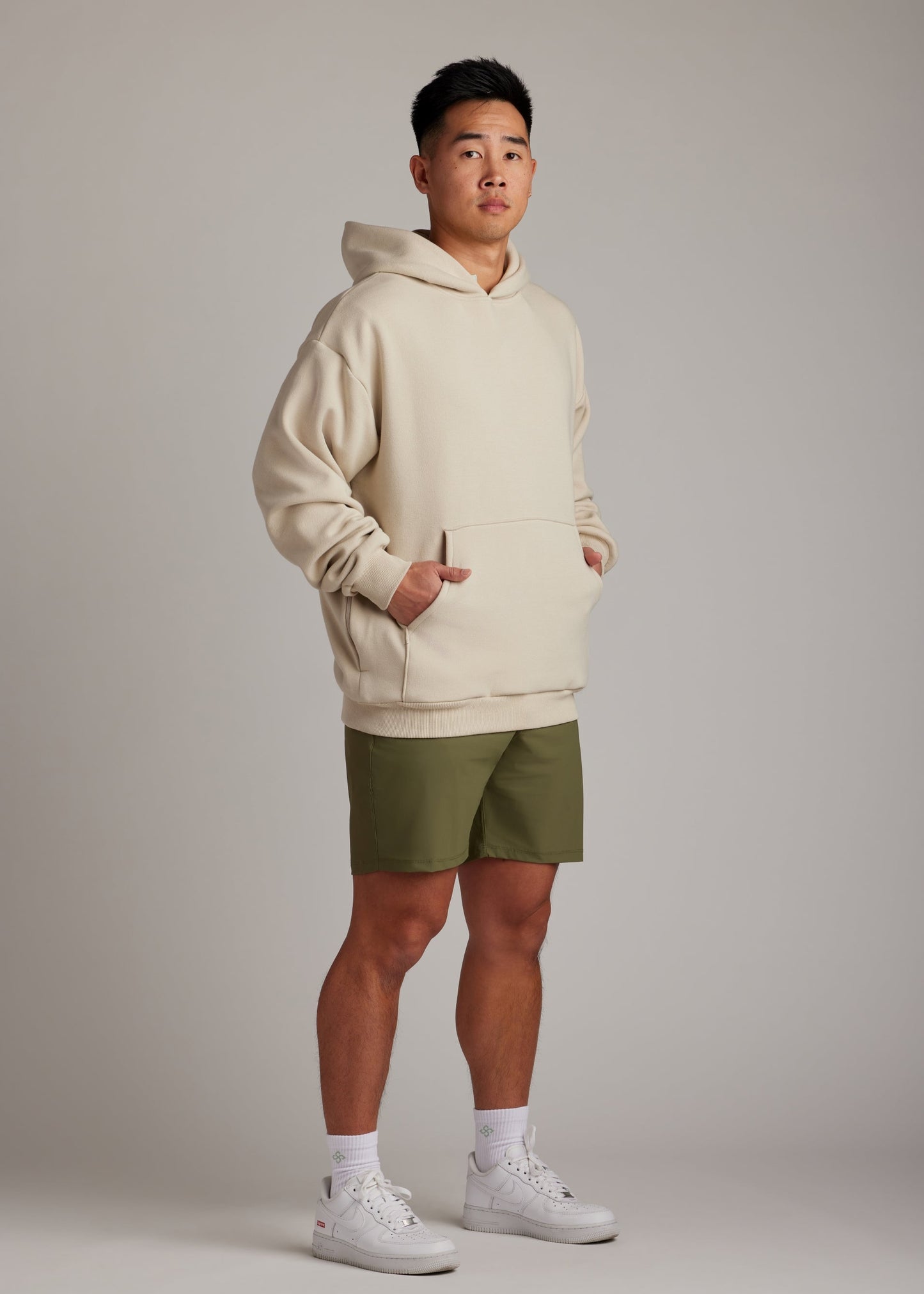 Cream Tomorrow Hoodie, an oversized premium cotton blend outerwear for modern comfort.
