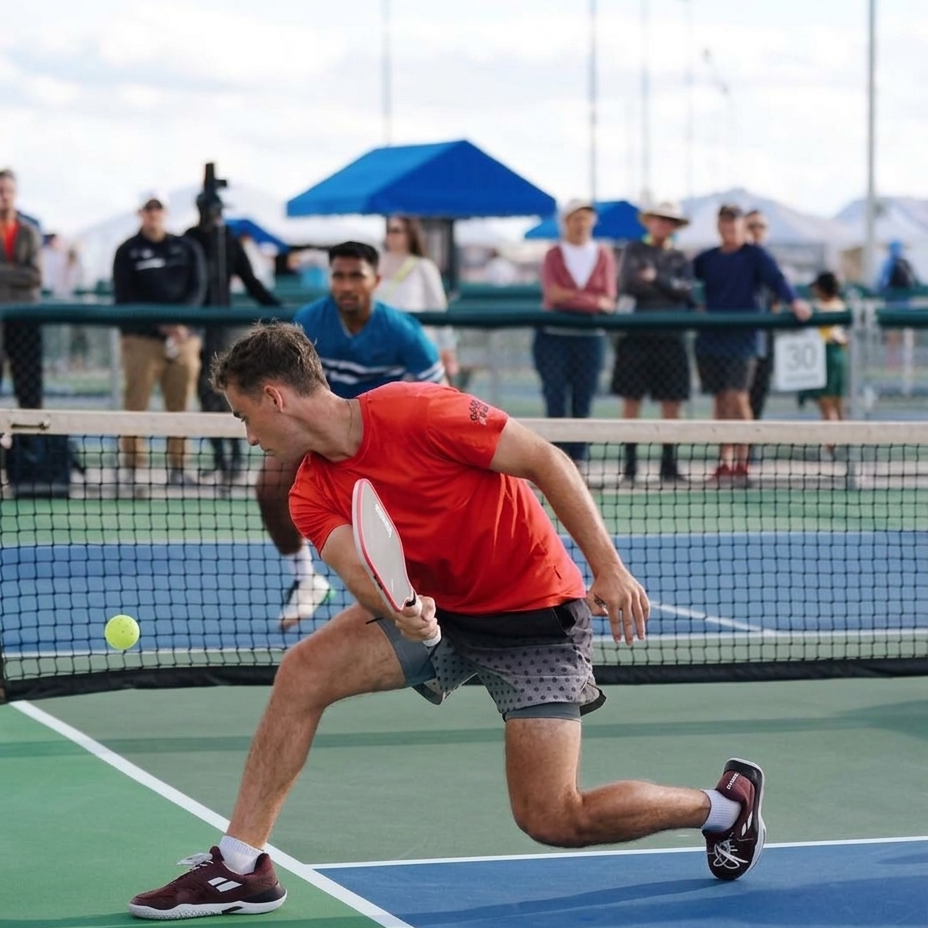 Dylan Frazier playing pickleball at a tournament wearing hasumu fade shorts activewear athletic