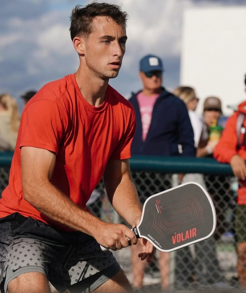 Dylan Frazier playing pickleball wearing hasumu gradient shorts activewear 