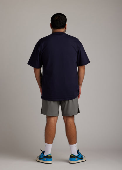 Gray hyper-breathable active shorts with zippered, mesh-lined front pockets for convenience.
