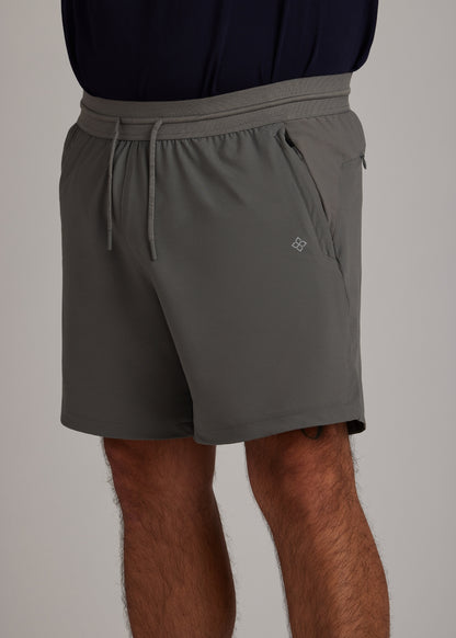 Gray hyper-breathable active shorts with zippered pockets, ideal for intense workouts.