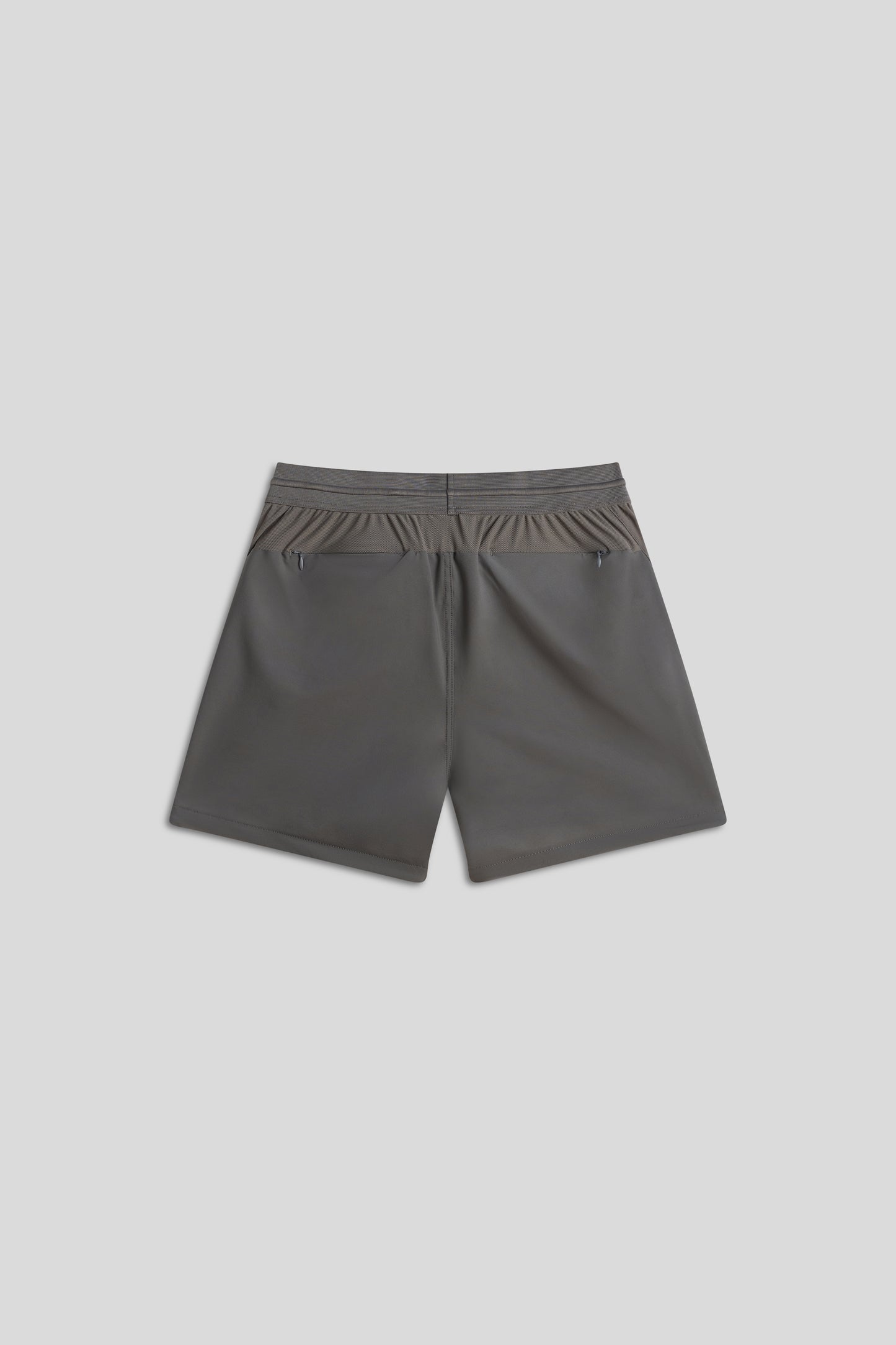 Gray hyper-breathable active shorts with elastic drawstring and zippered pockets for pickleball athleisure.