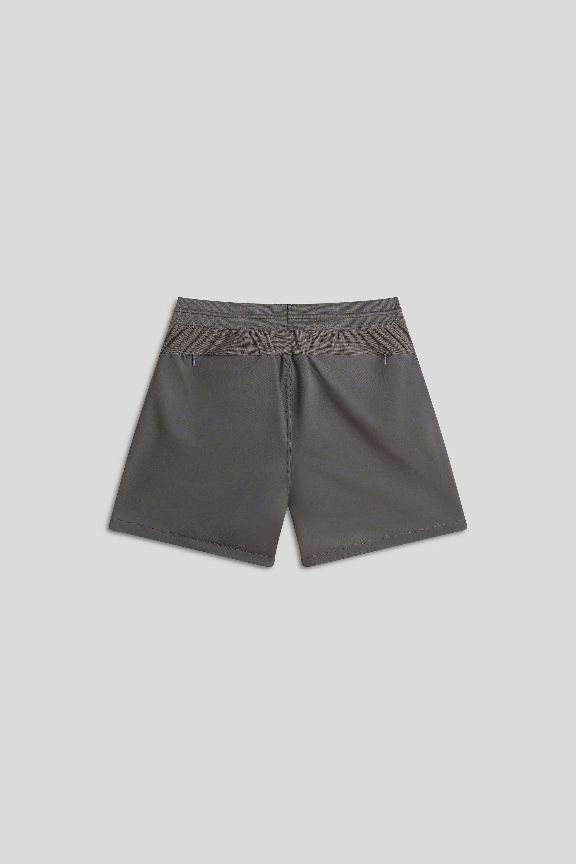 Gray hyper-breathable active shorts with elastic drawstring and zippered pockets for pickleball athleisure.