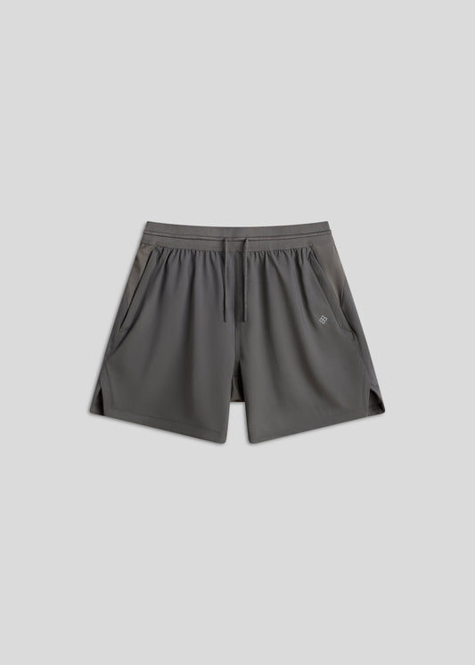 Gray hyper-breathable active shorts with elastic drawstring and zippered pockets for pickleball athleisure.