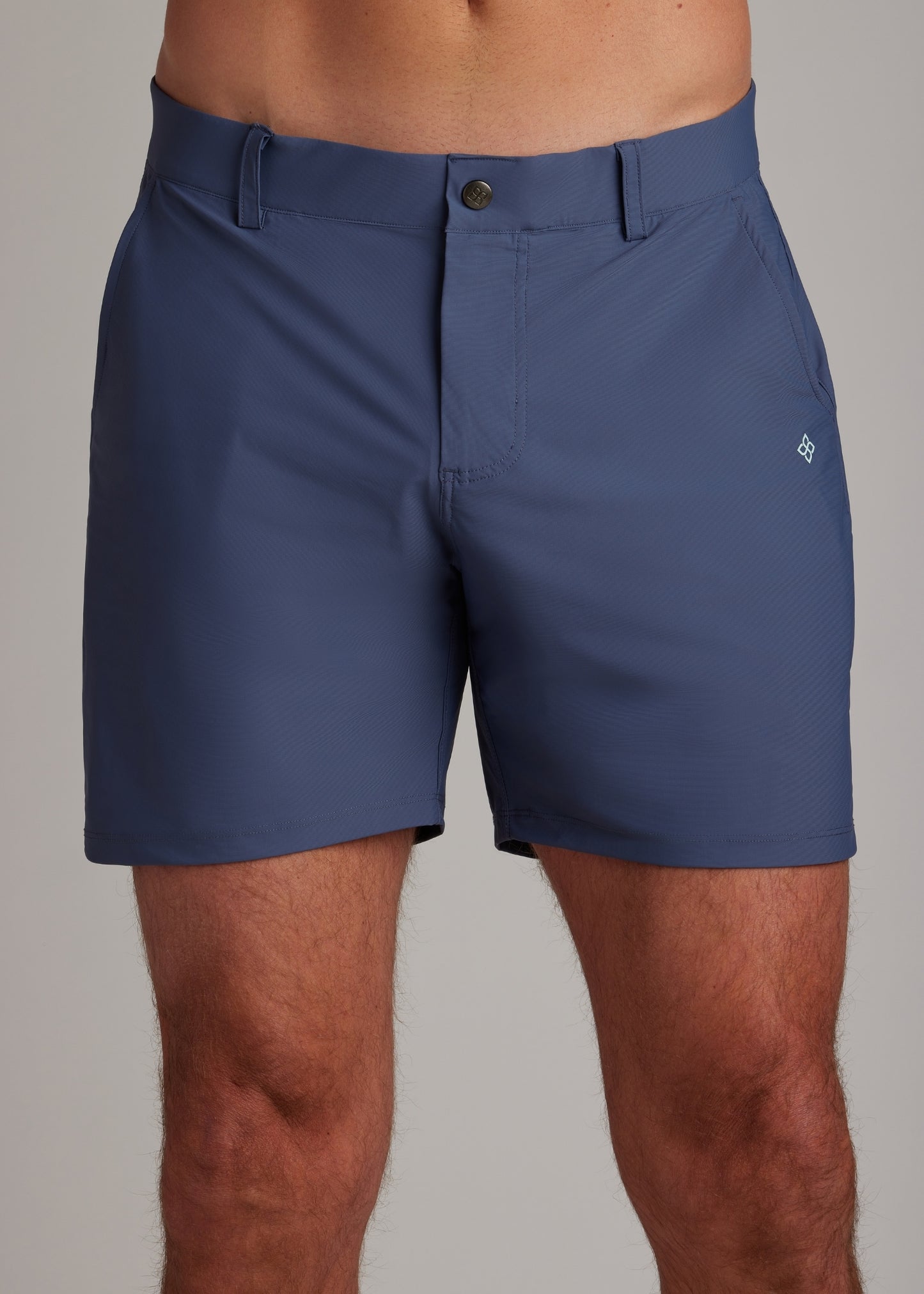 Indigo golf walk shorts for athletes, made with ultra-lightweight, four-way stretch fabric.
