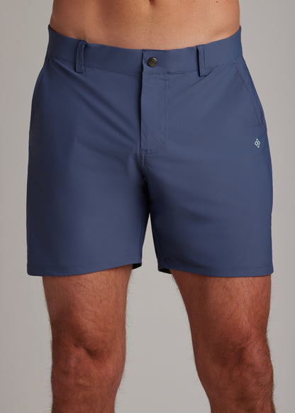 Indigo golf walk shorts for athletes, made with ultra-lightweight, four-way stretch fabric.