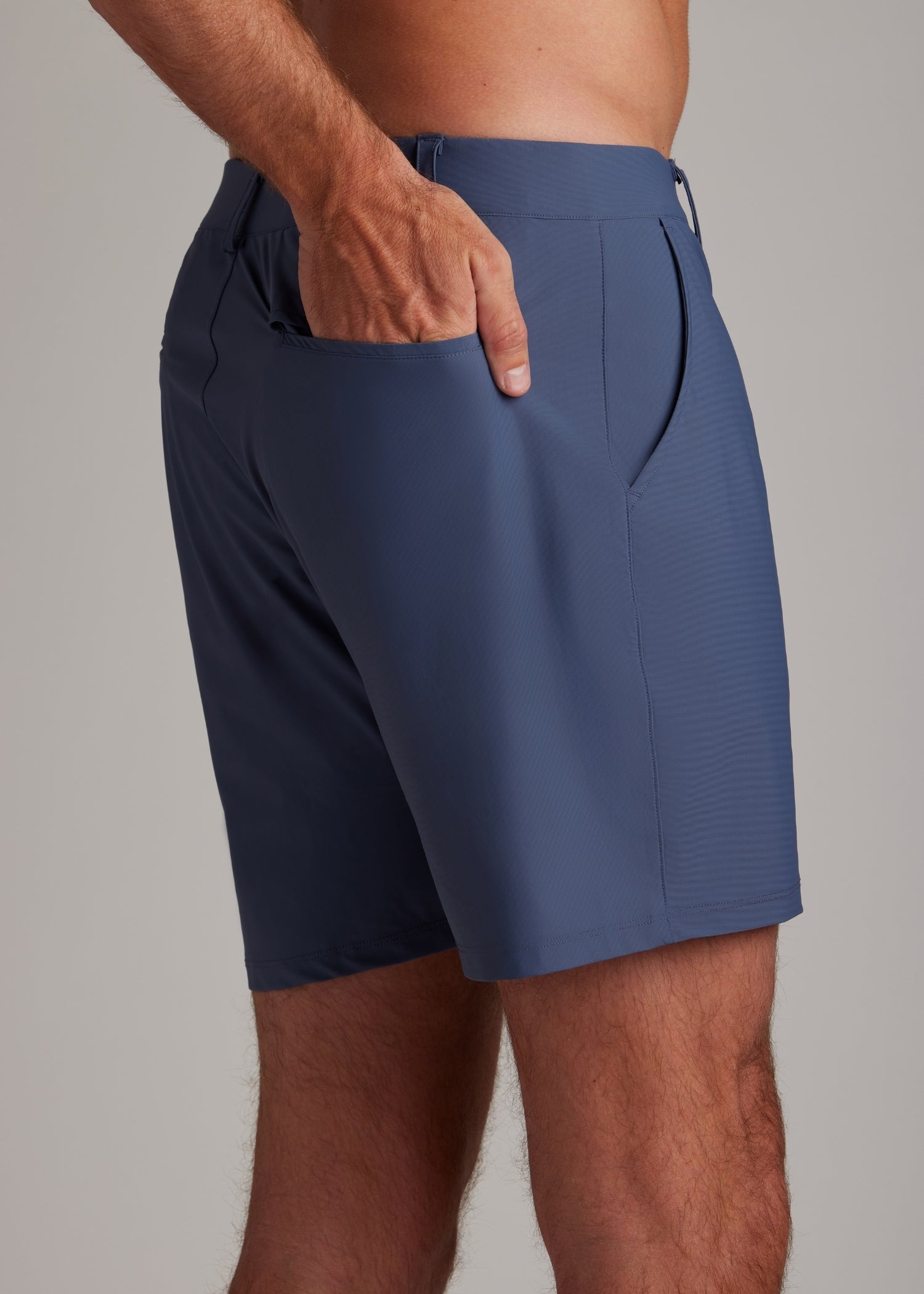 Indigo golf walk shorts for modern athletes, featuring lightweight, four-way stretch fabric.