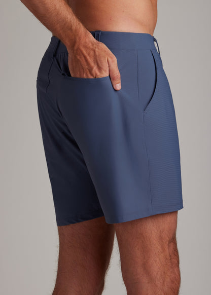 Indigo golf walk shorts for modern athletes, featuring lightweight, four-way stretch fabric.