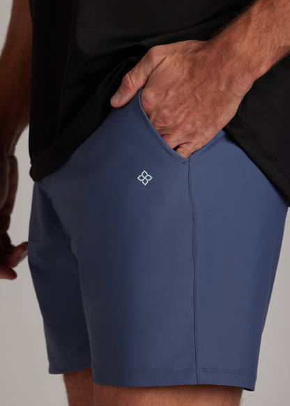 Indigo golf walk shorts designed for athletes, with ultra-lightweight, four-way stretch fabric.