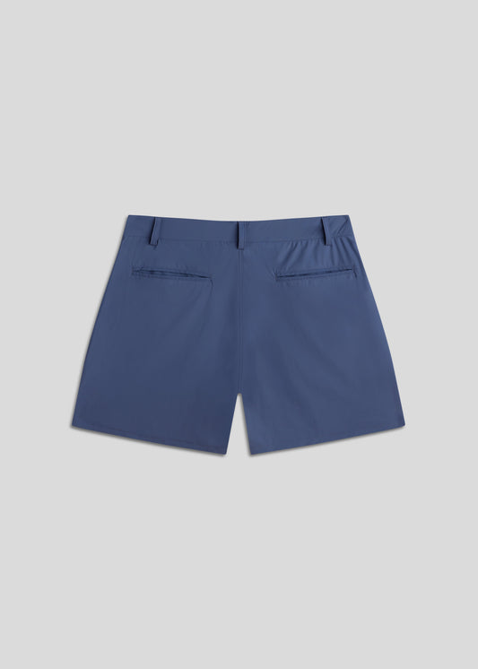 Indigo golf walk shorts made from ultra-lightweight, four-way stretch fabric.