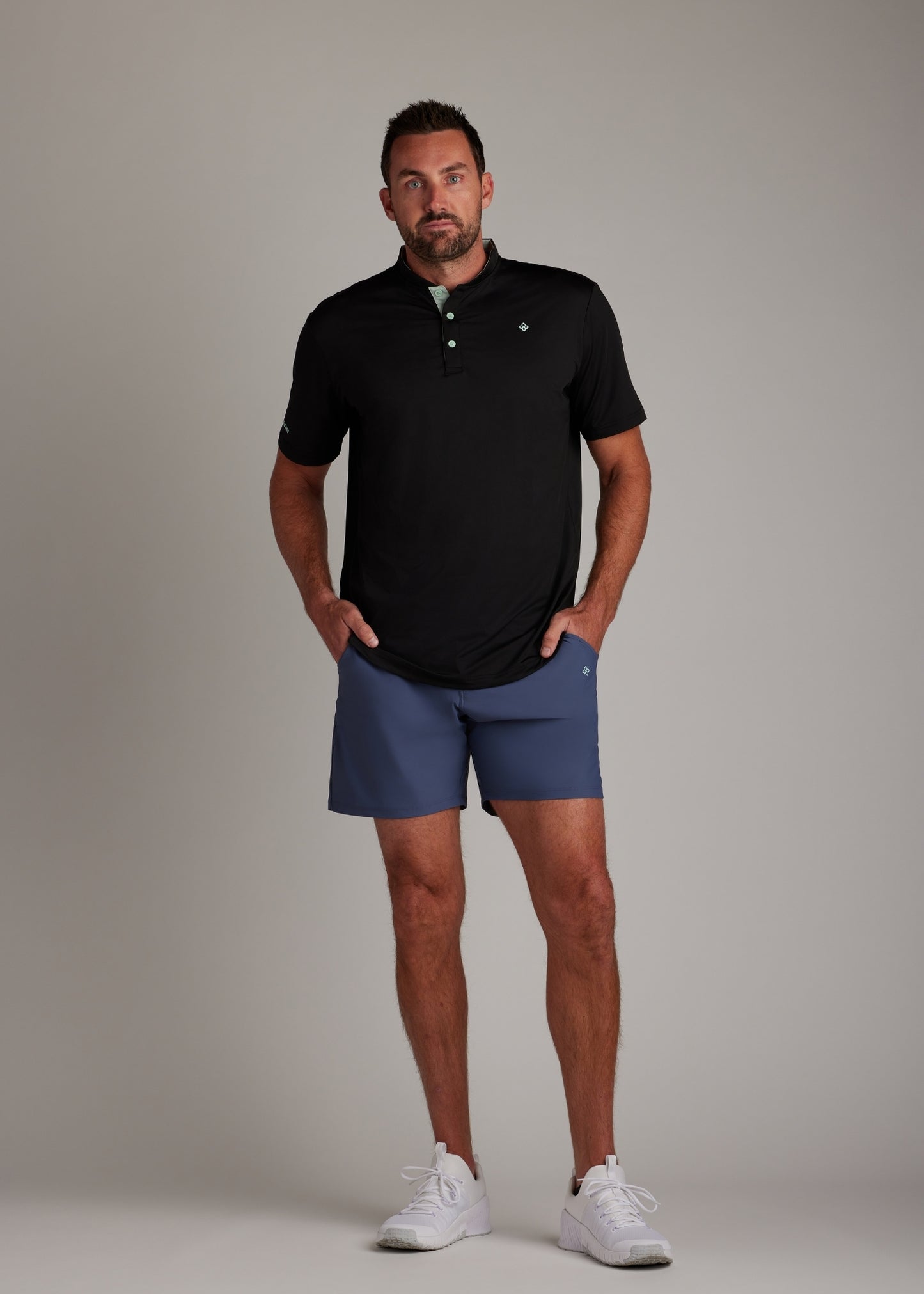 Indigo golf walk shorts made from ultra-lightweight four-way stretch fabric for athletes.
