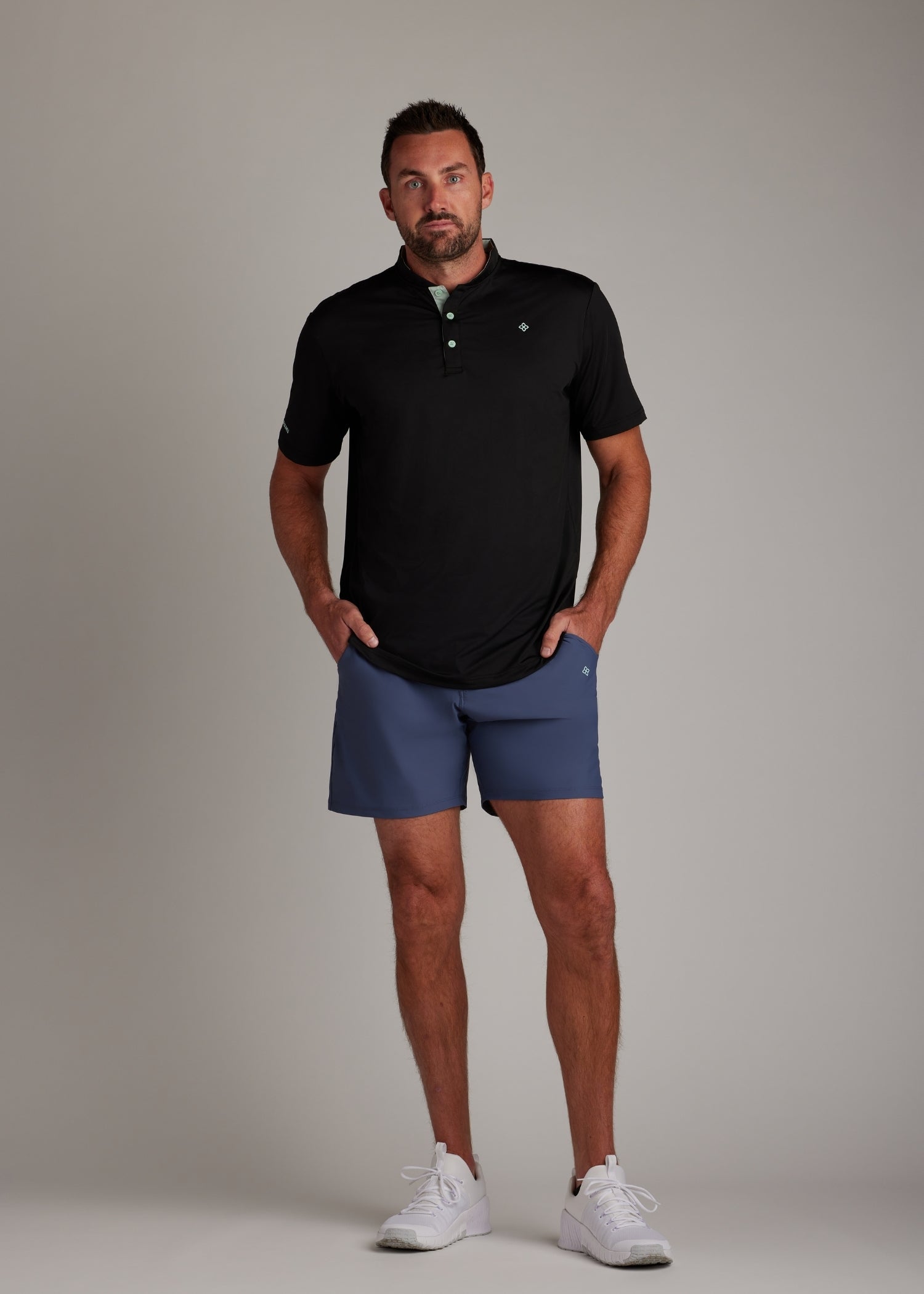 Indigo golf walk shorts made from ultra-lightweight four-way stretch fabric for athletes.