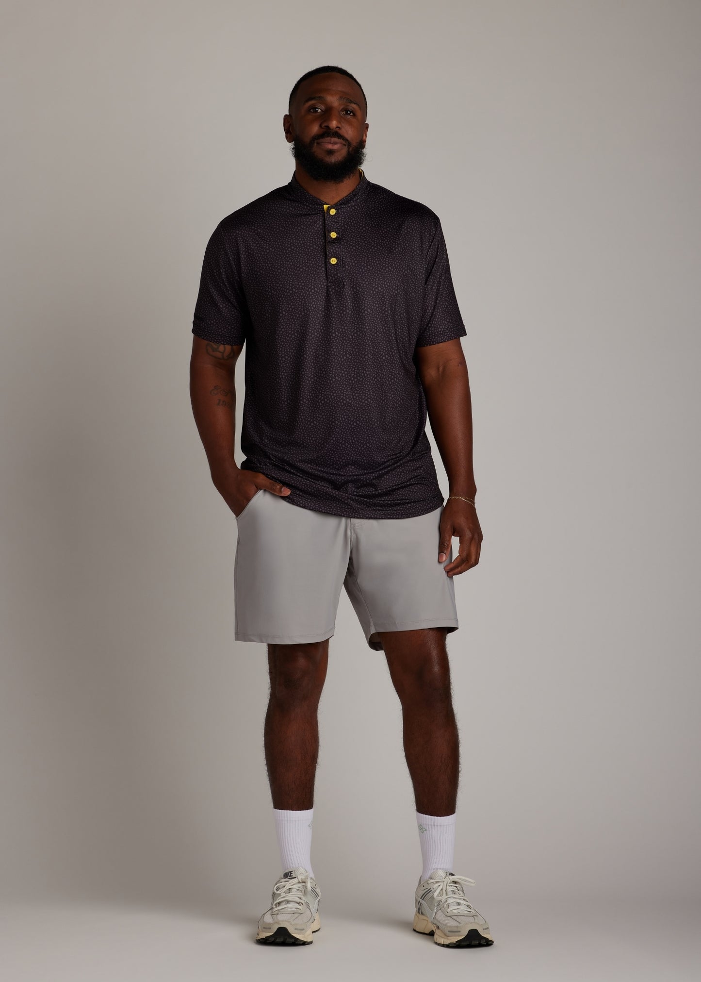 Light grey golf walk shorts crafted from ultra-lightweight, four-way stretch fabric.