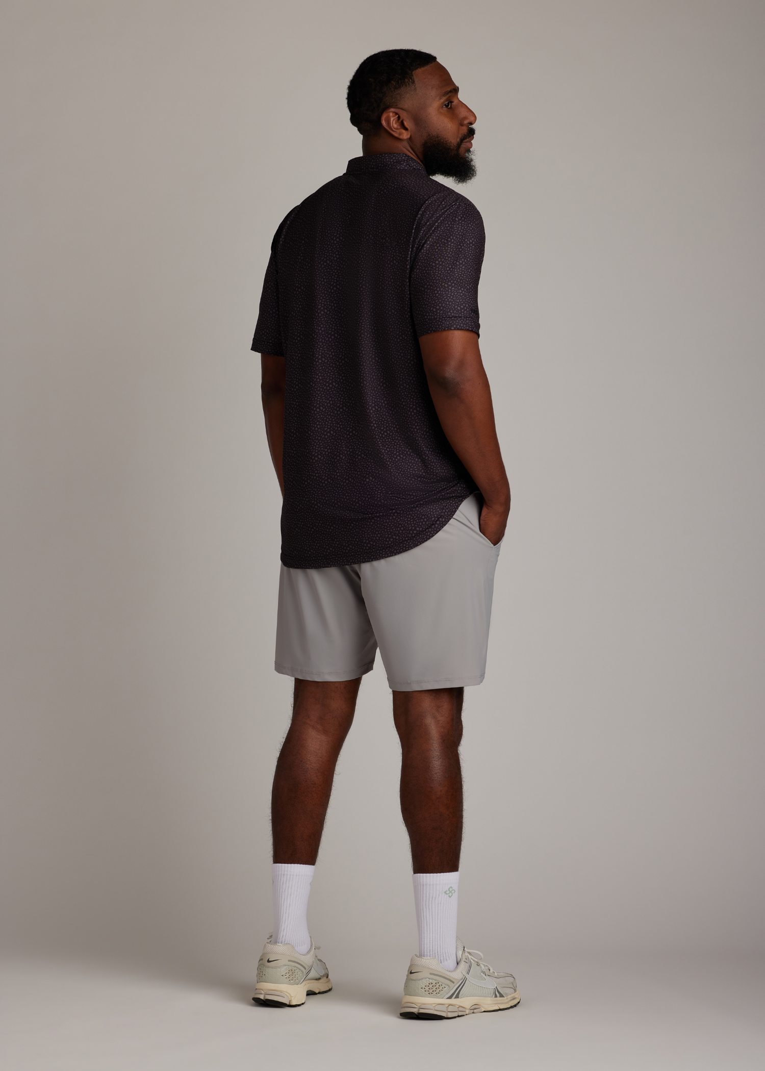 Light grey golf walk shorts crafted from ultra-lightweight, four-way stretch fabric.