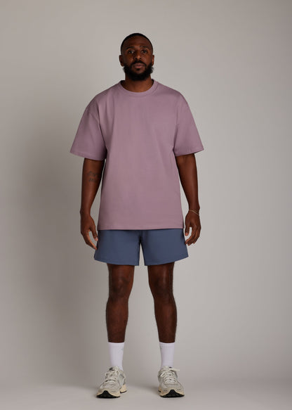 Lilac oversized tee made from soft, breathable fabric for comfortable casual wear.