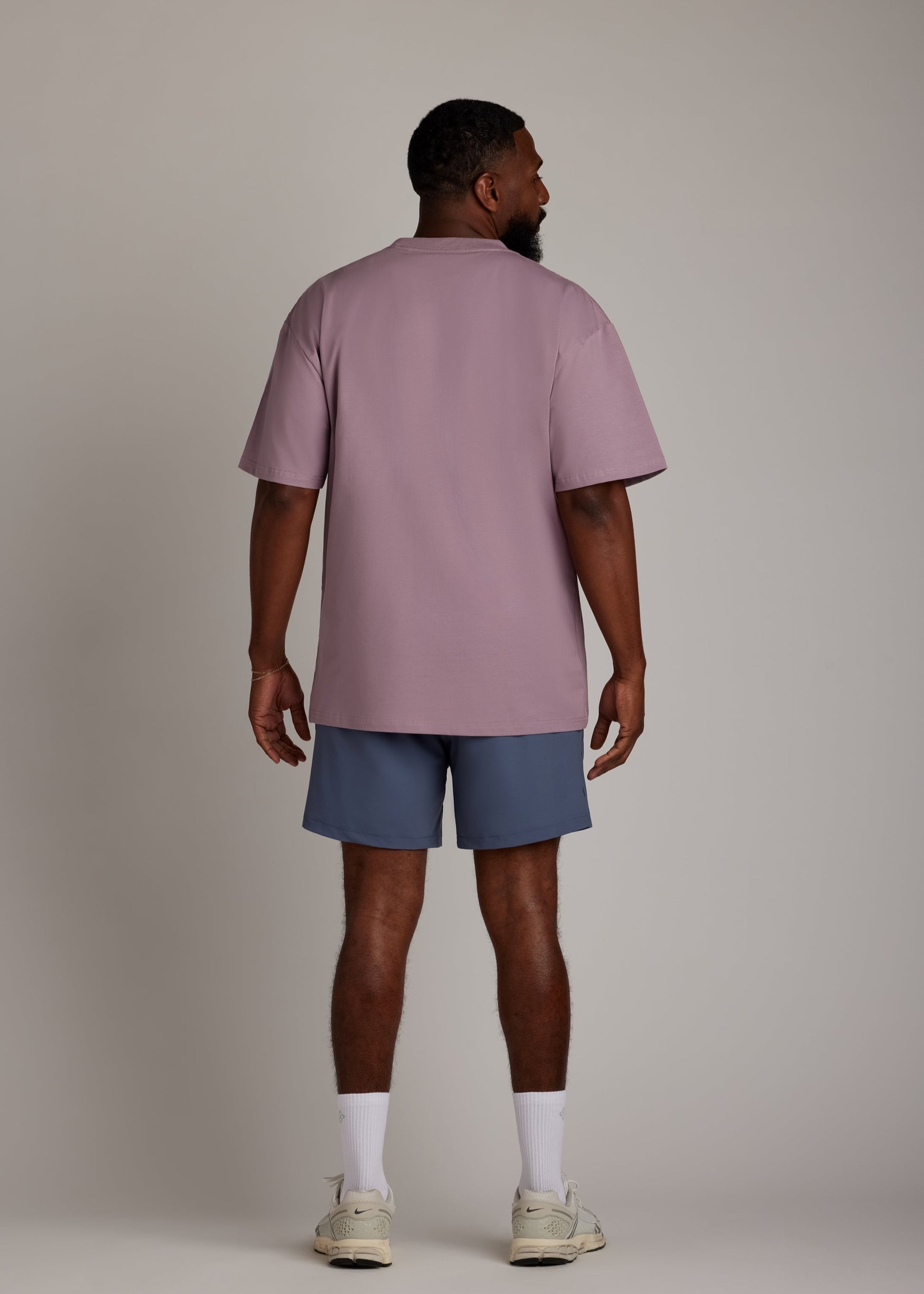 Lilac oversized tee made from soft, breathable fabric for comfortable casual wear.