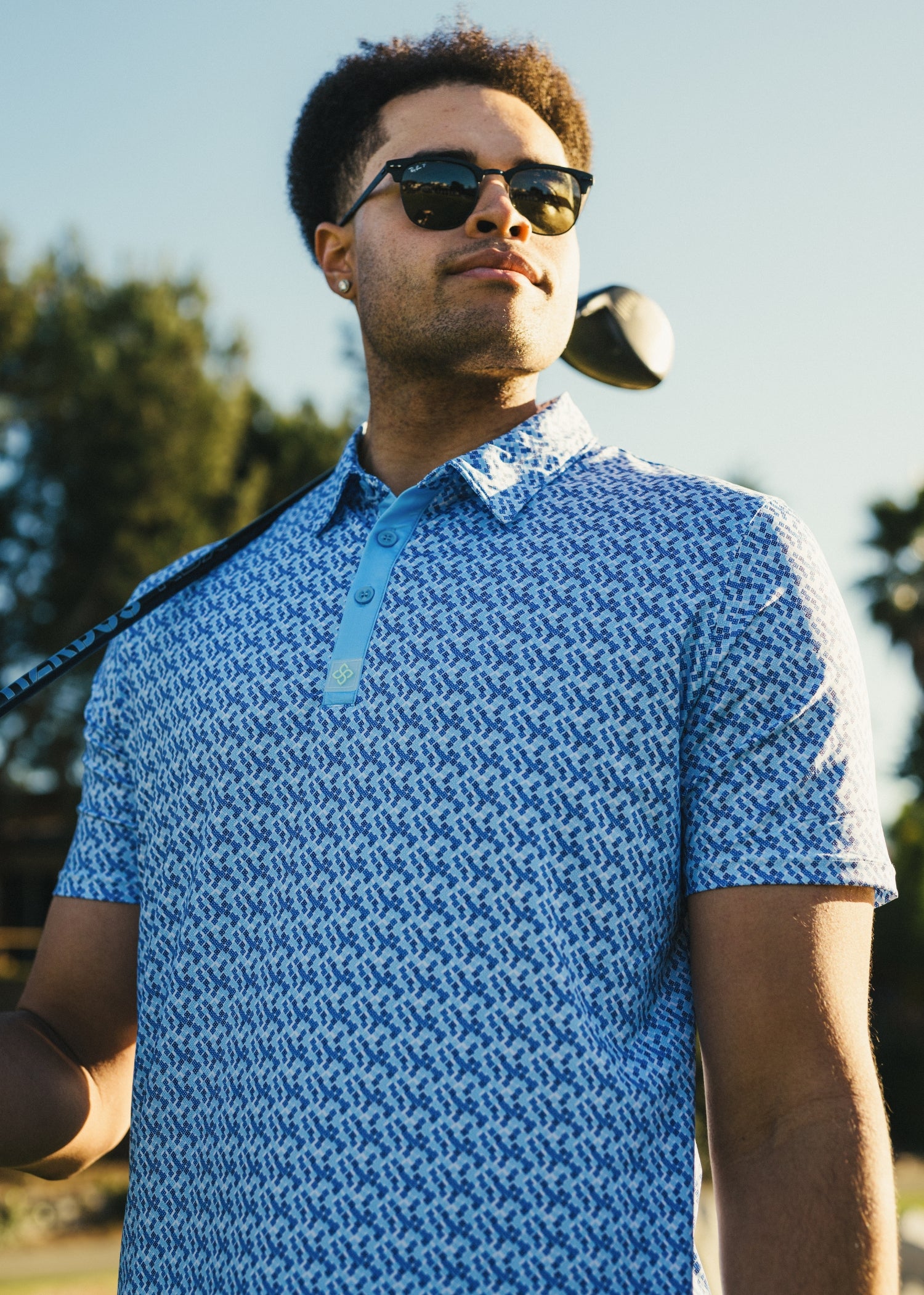 Matrix blue classic fit polo shirt crafted from stretchy fabric for maximum movement.