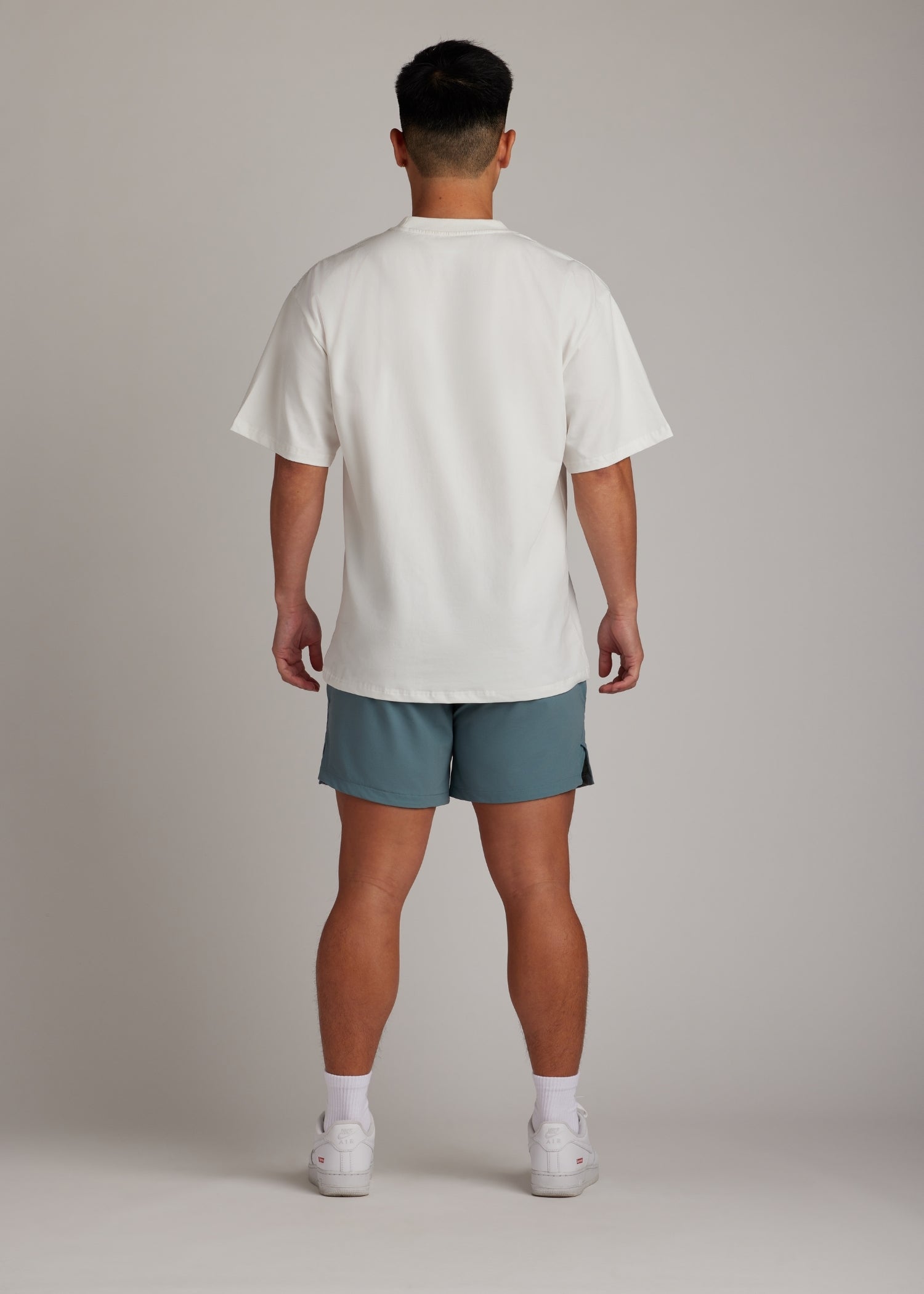 Midnight emerald active shorts, hyper-breathable for running, training, and everyday athleisure wear.