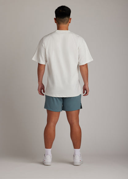 Midnight emerald active shorts, hyper-breathable for running, training, and everyday athleisure wear.