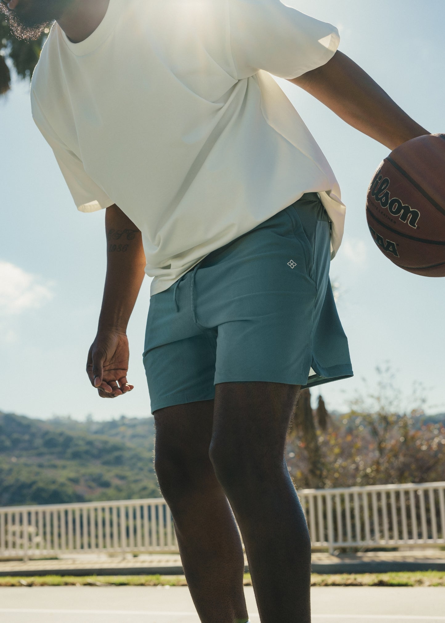 Midnight Emerald active shorts made from versatile fabric for training.