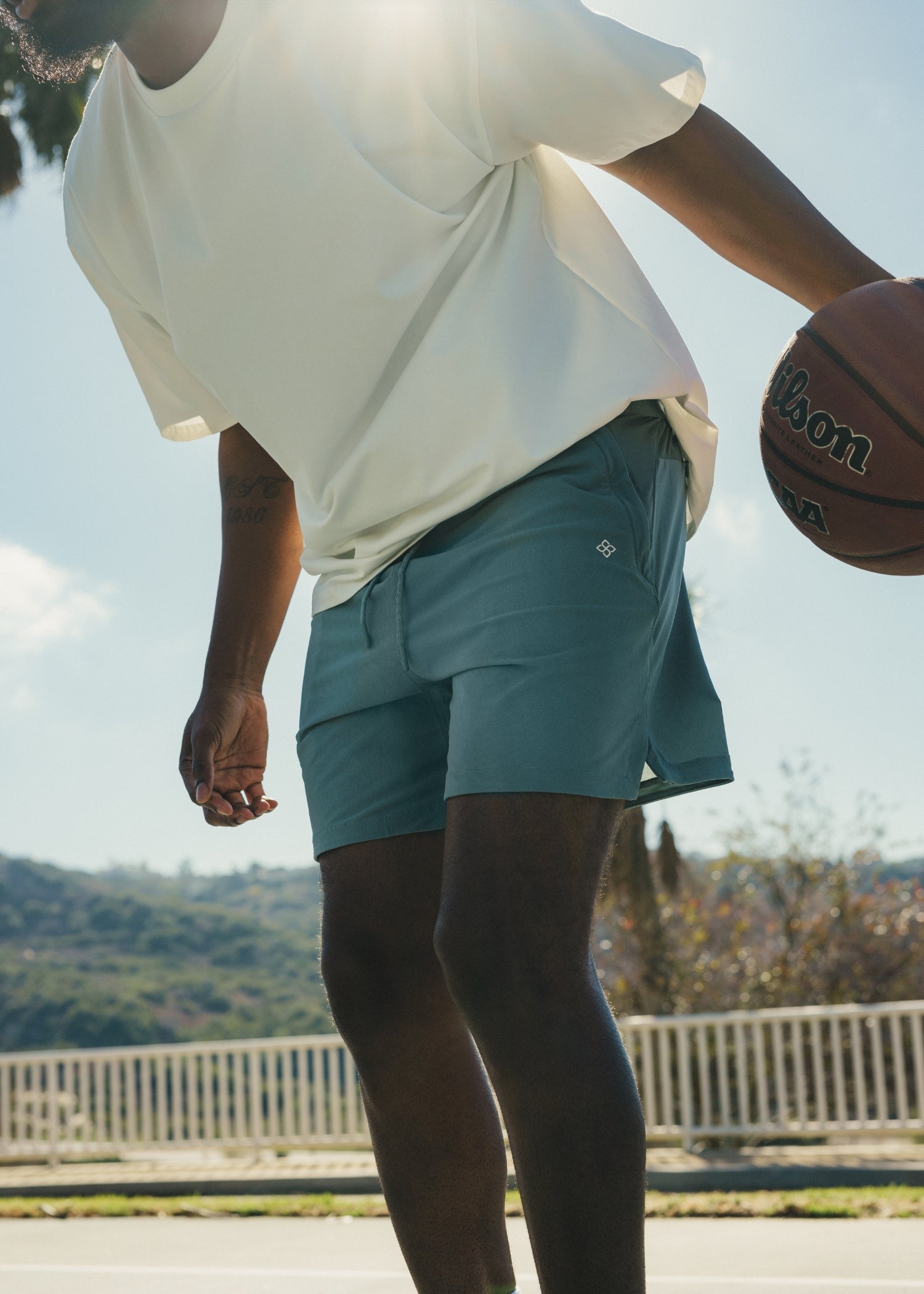 Midnight Emerald active shorts made from versatile fabric for training.