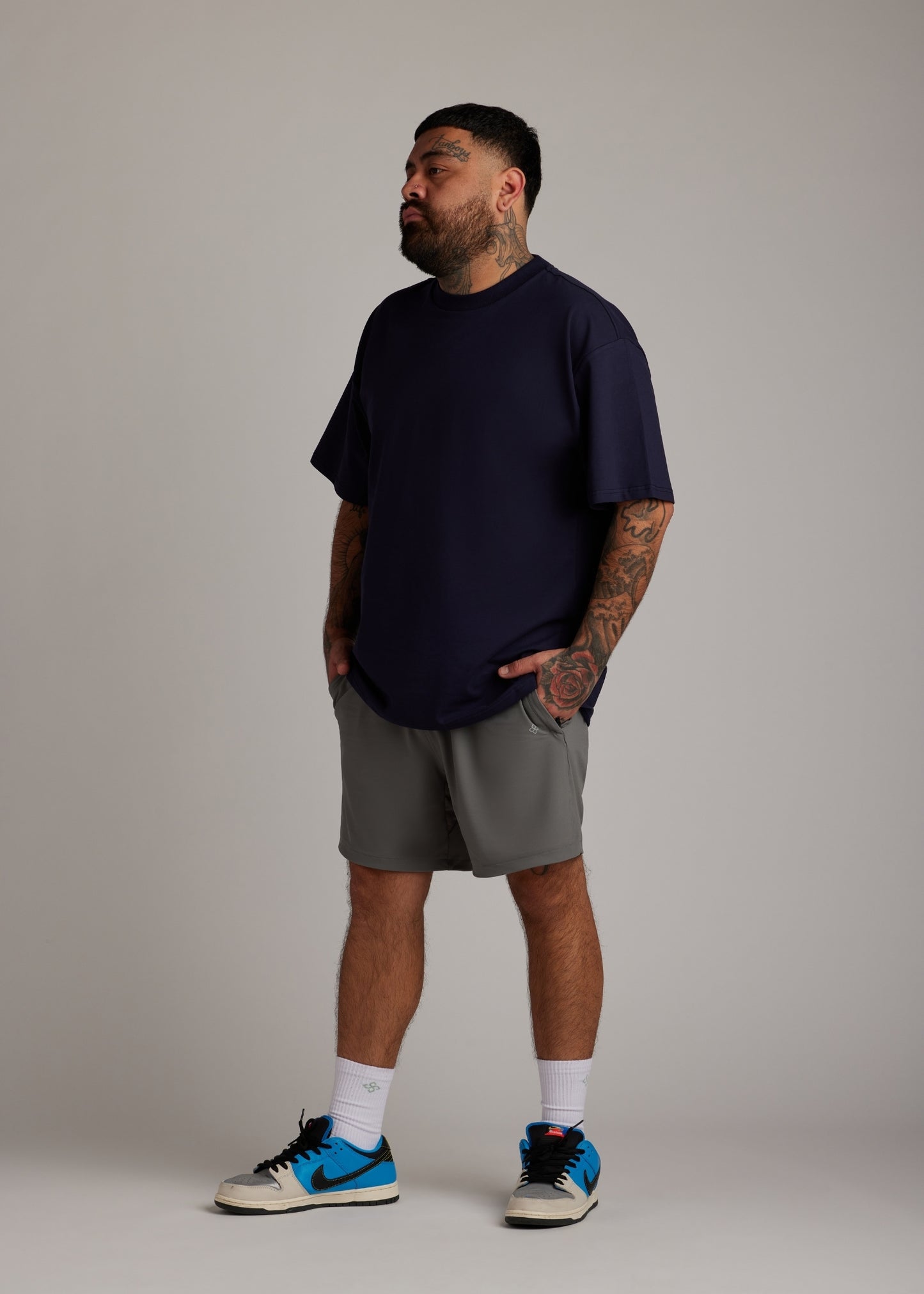 Navy oversized tee crafted from soft, breathable fabric, perfect for laid-back casual wear.