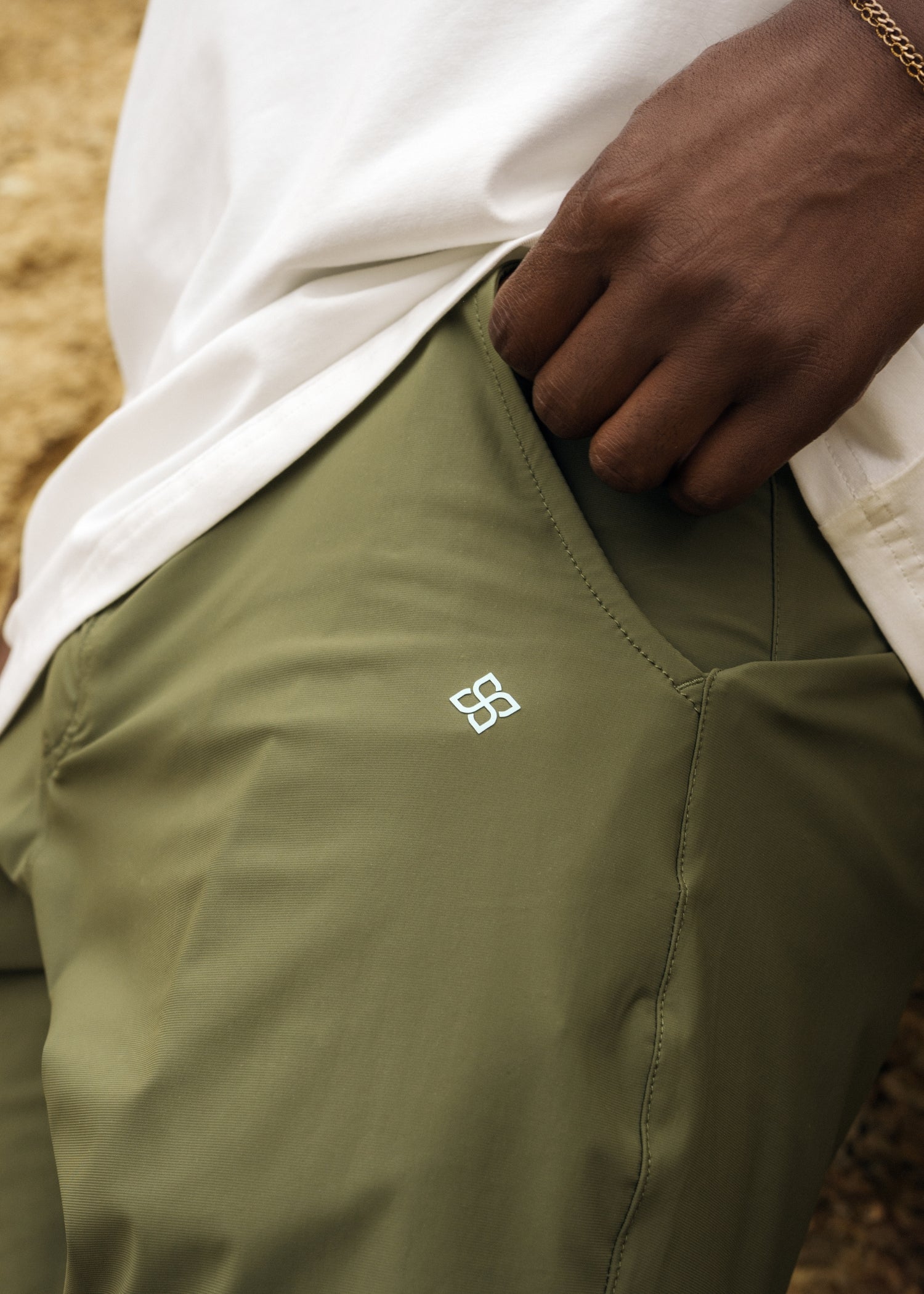 Olive golf walk shorts made from ultra-lightweight, four-way stretch fabric.