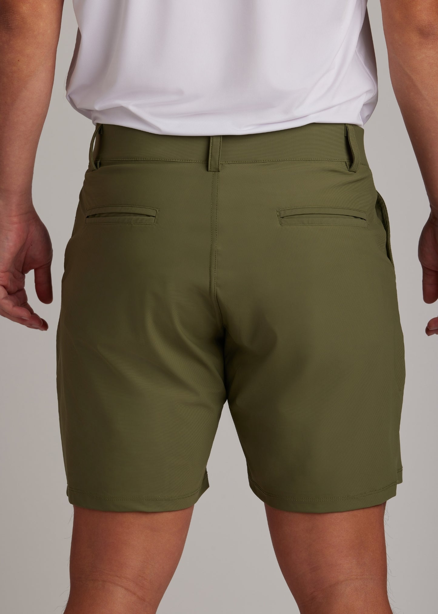 Olive golf walk shorts made from ultra-lightweight, four-way stretch fabric.