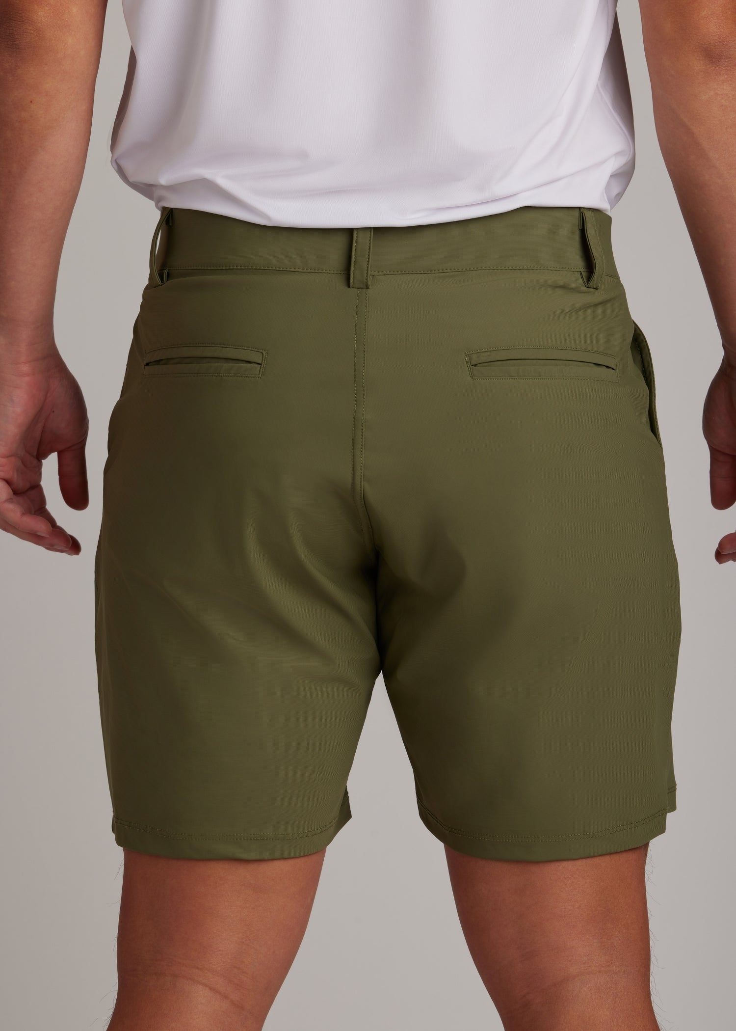 Olive golf walk shorts made from ultra-lightweight, four-way stretch fabric.