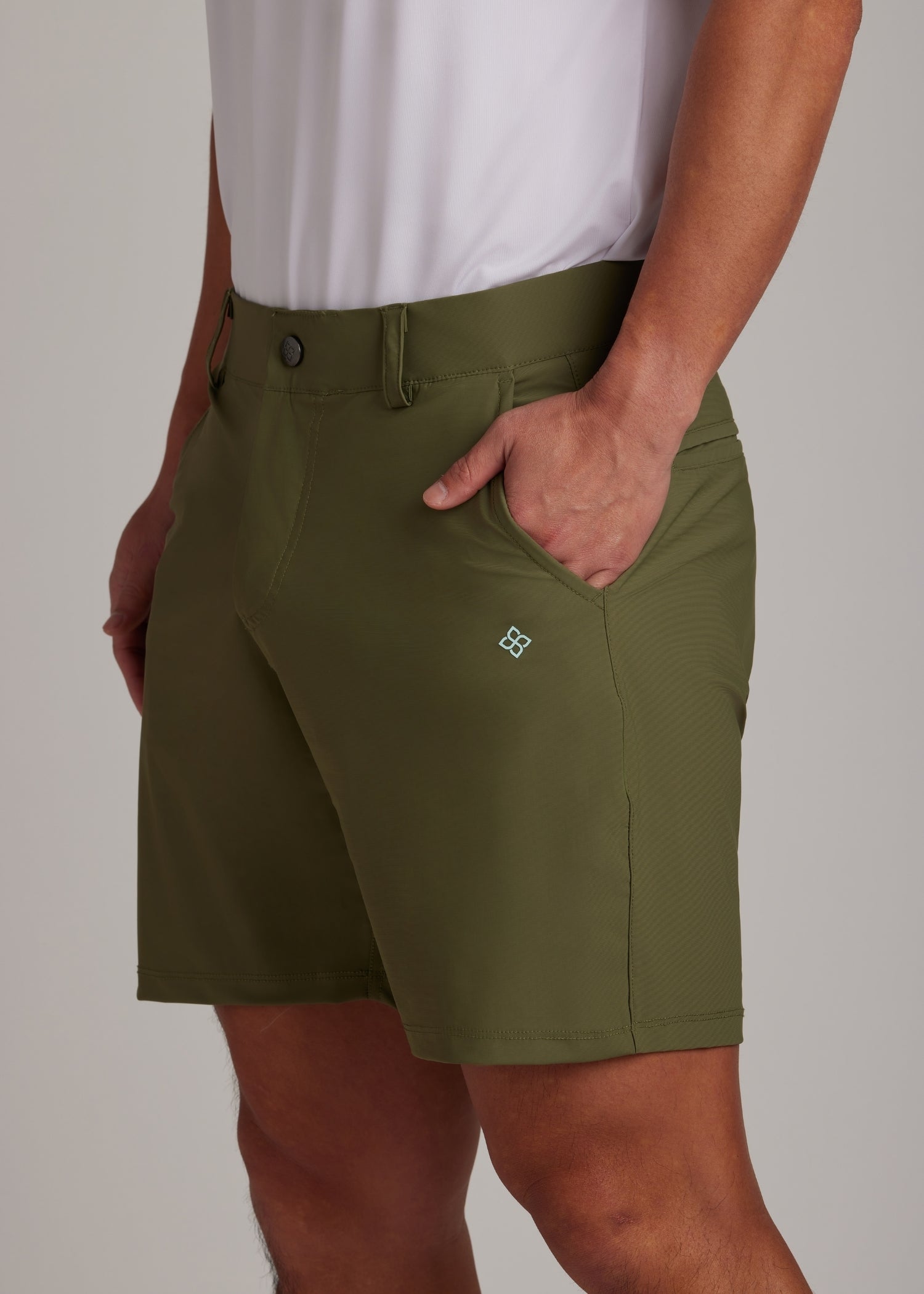 Olive golf walk shorts made from ultra-lightweight, four-way stretch fabric.