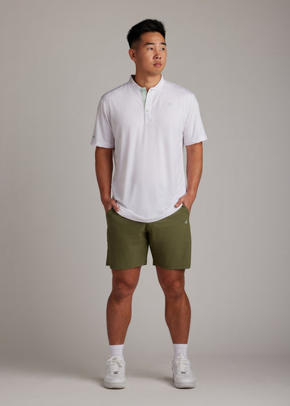 Olive golf walk shorts made from ultra-lightweight, four-way stretch fabric.