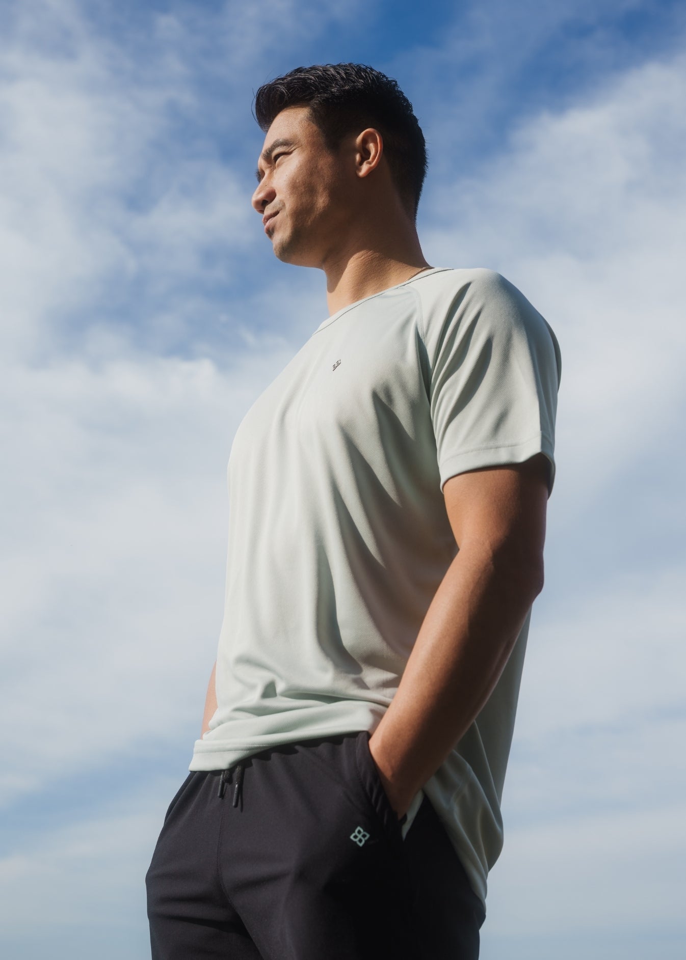 Seafoam green active tee made from ultra-light, breathable stretch fabric for athletic fit.