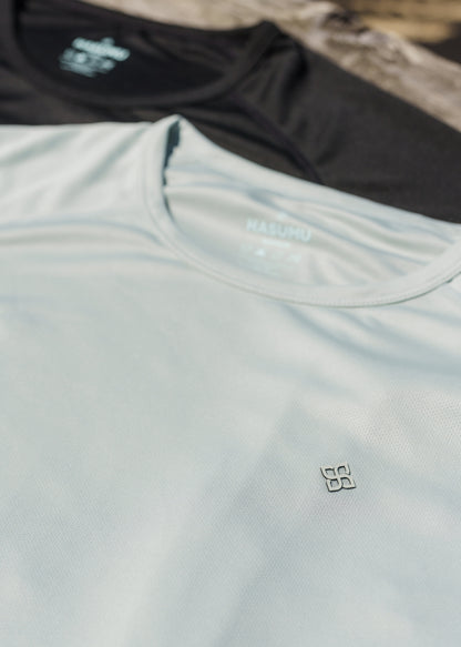 Seafoam green active tee made from ultra-light, breathable stretch fabric for athletic fit.