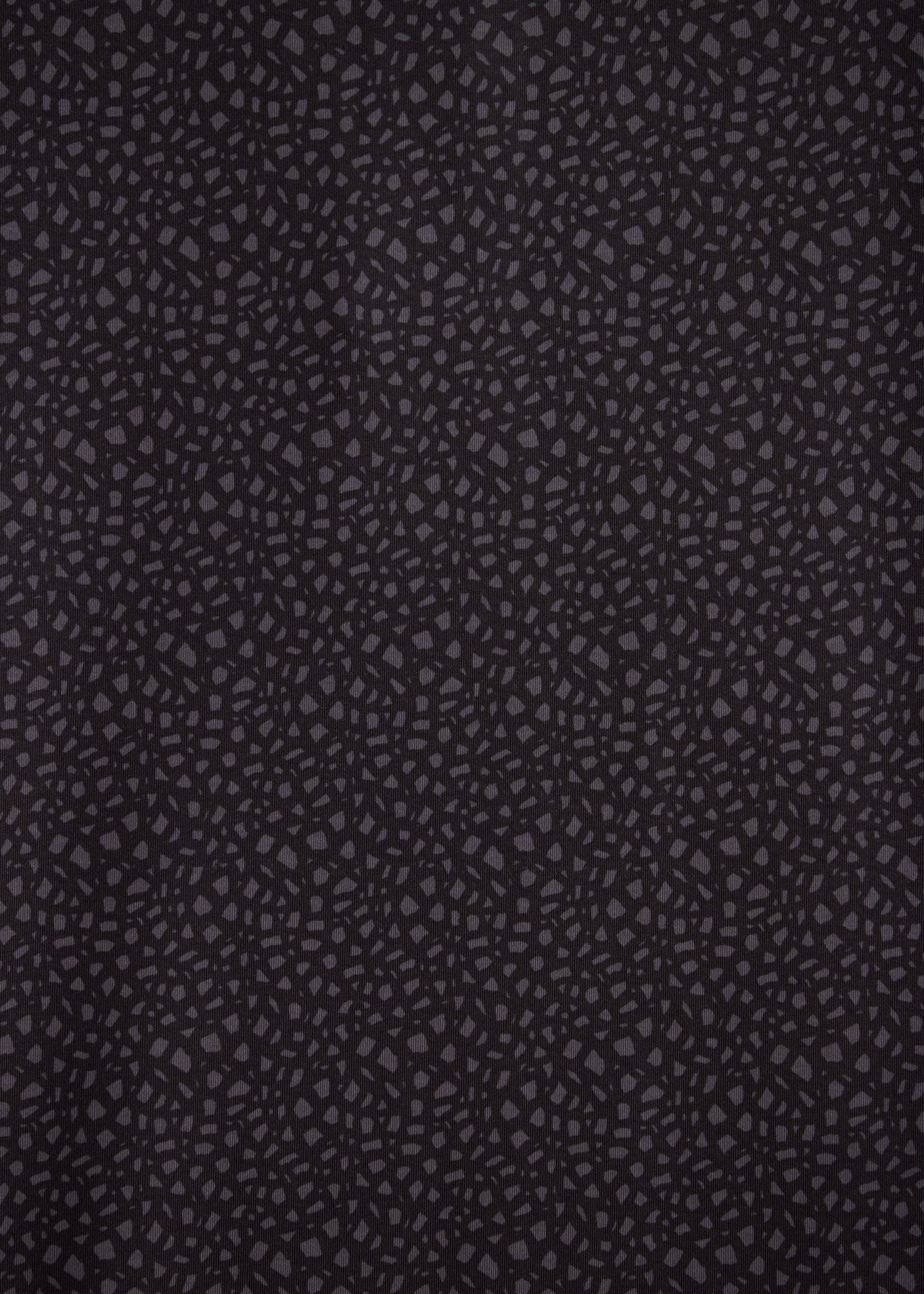Sleek bladed collar polo shirt featuring a unique snake skin pattern for modern style.