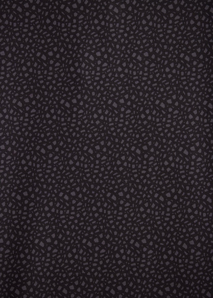 Sleek bladed collar polo shirt featuring a unique snake skin pattern for modern style.